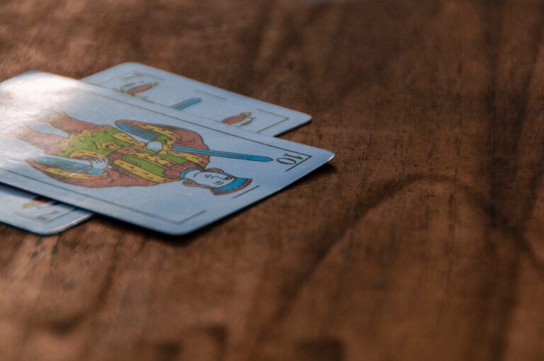 Close-up of playing cards on a wooden table